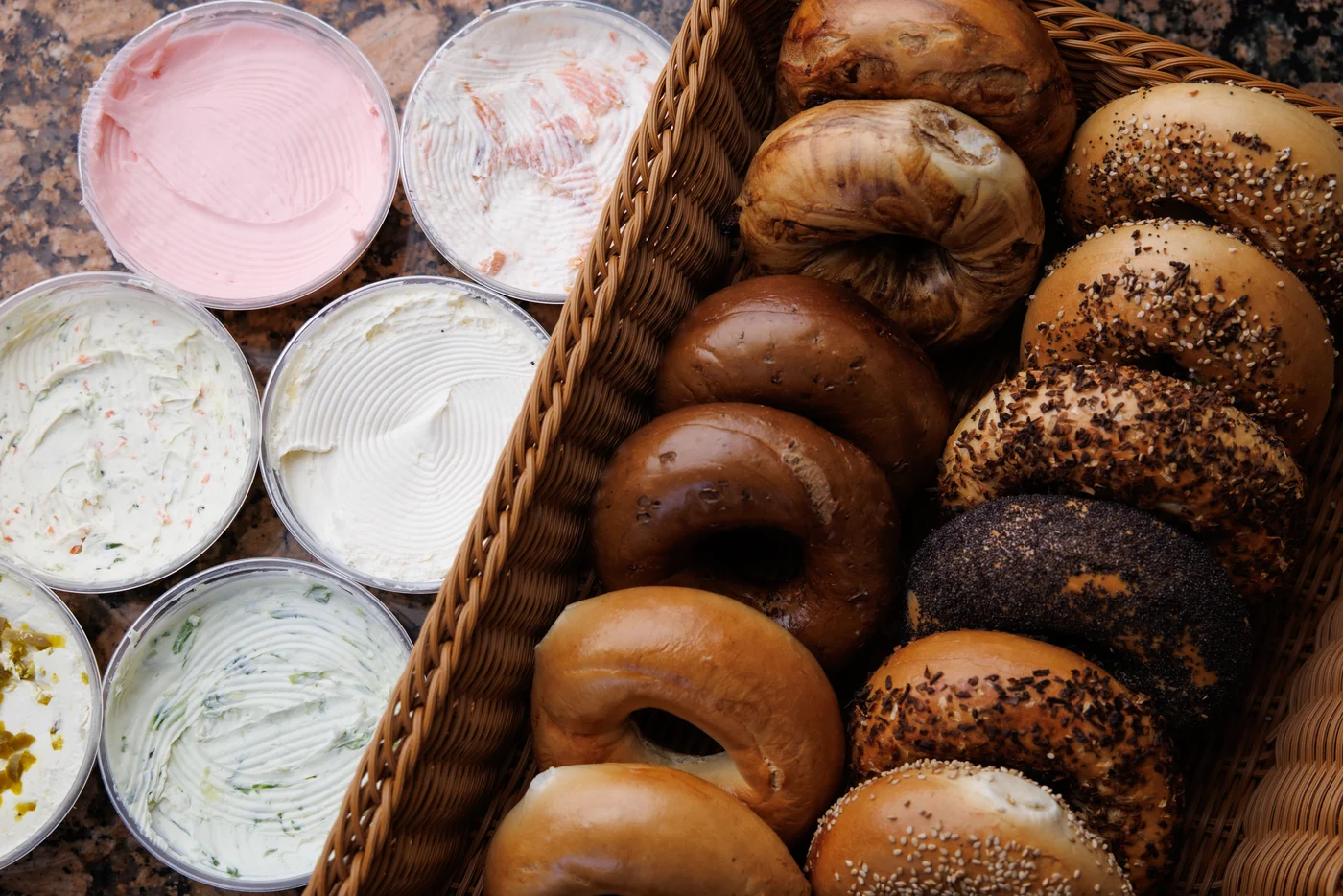 An assortment of Bagel Boyz bagels and cream cheese spreads