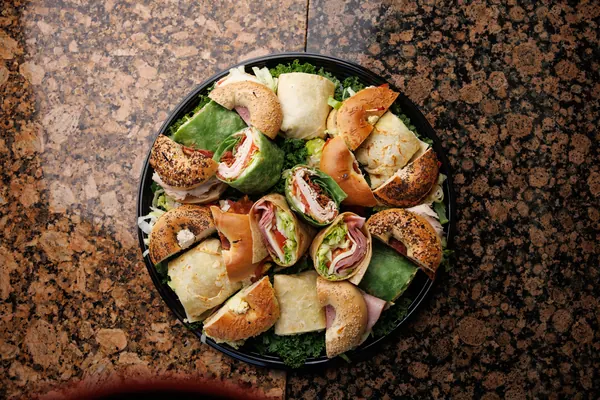 Bagel Boyz sandwich platter of cut wraps and bagel sandwiches